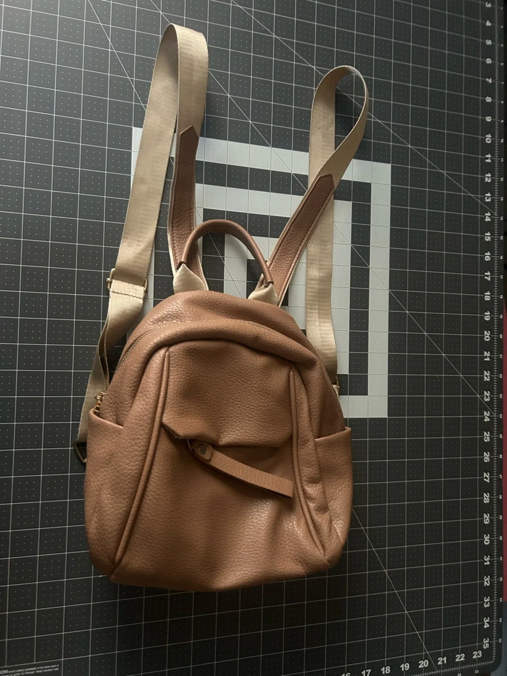 Casual Brown Pebbled Leather Backpack with Beige Webbing Straps